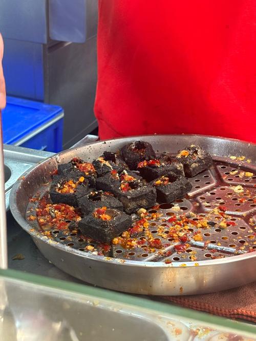 中國臭豆腐為什麼是黑的揭秘其獨特色澤與風味的奧秘 1 中國臭豆腐為什麼是黑的