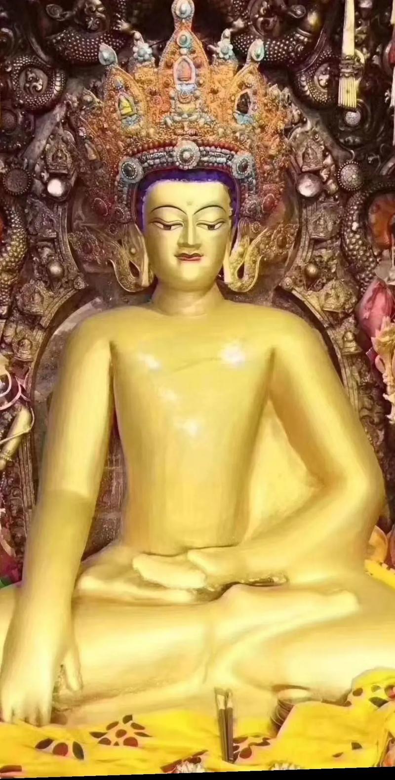 釋迦摩尼佛手持什麼